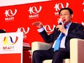 Phó thủ tướng Vương Đình Huệ trao đổi tại Diễn đàn M&A Việt Nam 2018. (Ảnh: ĐTCK)