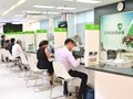 Khách hàng giao dịch tại các chi nhánh của Vietcombank. Ảnh: Web Vietcombank.