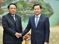 Phó Thủ tướng Lê Minh Khái tiếp Bộ trưởng Bộ Tài chính Lào Bounchom Ubonpaseuth (Ảnh: VGP)