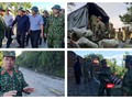 Lực lượng quân đội mở đường vào cứu nạn 53 người bị vùi lấp ở Trà Leng (Ảnh: Hoà Bình ghép)