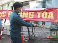 Lực lượng chức năng đang kiểm soát khu vực phong toả quận 6 (Ảnh: Hải Linh)