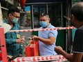 Phong toả khu dân cư 2.000 người tại hẻm 168 Nguyễn Cư Trinh (Ảnh: Đình Văn)