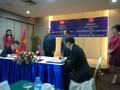 Lễ ký kết thỏa thuận ghi nhớ hợp tác giữa NEAC và LANIC có sự chứng kiến của Bộ trưởng Bộ TT&TT Trương Minh Tuấn và Bộ trưởng Bộ Bưu chính Viễn thông Lào Thansamay Kommasith (Ảnh do NEAC cung cấp)