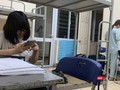 Các công dân Việt Nam ở nước ngoài về tuân thủ tốt yêu cầu cách ly y tế tập trung trong 15 ngày. Ảnh chụp tại khu cách ly Chung cư sinh viên Pháp Vân - Tứ Hiệp của TP. Hà Nội. Ảnh: Anh Lê.