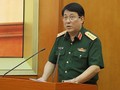Đại tướng Lương Cường trình bày báo cáo tại hội nghị.