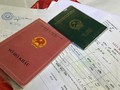 Người dân được tiếp tục sử dụng sổ hộ khẩu, sổ tạm trú đã được cấp cho đến hết ngày 31/12/2022. Ảnh: VGP.