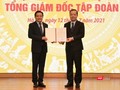 Chủ tịch HDDTV Tập đoàn VNPT Phạm Đức Long trao quyết định bổ nhiệm ông Huỳnh Quang Liêm giữ chức vụ Tổng giám đốc Tập đoàn VNPT.