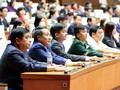 Các đại biểu Quốc hội thực hiện biểu quyết thông qua các nghị quyết. Ảnh: VGP.