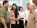 Tổng Bí thư Nguyễn Phú Trọng và các đại biểu dự hội nghị tiếp xúc cử tri tại điểm cầu quận Ba Đình.