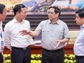Thủ tướng Phạm Minh Chính và Bộ trưởng Nguyễn Mạnh Hùng cùng các thành viên Chính phủ trao đổi tại Hội nghị lần thứ nhất của Hội đồng điều phối vùng Đông Nam Bộ.