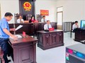 Đại diện VKSND trình bày quan điểm tại phiên tòa trực tuyến. Ảnh minh hoạ.