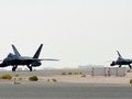 Phi cơ chiến đấu F-22 Raptor có mặt tại căn cứ không quân Al Udeid, Qatar ngày 27/6 (Ảnh: CNN)
