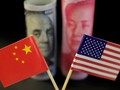 Thương chiến Mỹ-Trung có thể biến thành một cuộc chiến tiền tệ (Ảnh: Reuters)