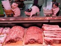 Thịt lợn trở nên khan hiếm, giá cả tăng cao đột biến khiến người dân không dám bỏ tiền ra mua (Ảnh: Washington Post)