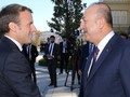 Tổng thống Pháp Emmanuel Macron và Ngoại trưởng Thổ Nhĩ Kỳ Mevlut Cavusoglu (Ảnh: RT)