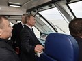 Tổng thống Putin trên khoang lái của con tàu di chuyển tới Crimea (Ảnh: MoscowTimes)