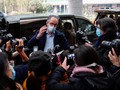 Trưởng nhóm điều tra của WHO Peter Ben Embarek tại sân bay Vũ Hán hôm 10/2 (Ảnh: Reuters)