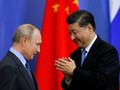 Tổng thống Nga Vladimir Putin và Chủ tịch Trung Quốc Tập Cận Bình (Ảnh: Reuters)
