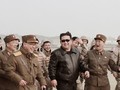 Lãnh đạo Triều Tiên Kim Jong-un cùng các tướng lĩnh quân đội trong vụ phóng thử nghiệm tên lửa hôm 24/3 (Ảnh: KCNA)