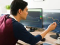 Hàng trăm triệu người đã đầu tư vào tiền mã hoá (Ảnh: CNBC)