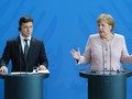 Tổng thống Ukraine Vladimir Zelensky và Thủ tướng Đức lúc bấy giờ Angela Merkel. Ảnh: Getty.