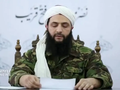 Hình ảnh thủ lĩnh HTS Abu Mohammed al-Jolani phát biểu tại một địa điểm không xác định năm 2016. Ảnh:: Reuters.