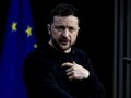 Nhà lãnh đạo Ukraine Volodymyr Zelensky trong cuộc họp báo ở Brussels ngày 19/12. Ảnh: Getty.