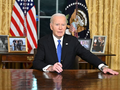 Tổng thống Mỹ Joe Biden phát biểu từ phía sau Chiếc bàn Kiên định, Phòng Bầu dục. Ảnh: Getty.