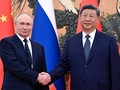 Tổng thống Nga Vladimir Putin và Chủ tịch Trung Quốc Tập Cận Bình trước cuộc gặp tại Bắc Kinh hôm 2/9. Ảnh: Reuters.