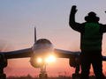 Một máy bay ném bom Tu-95 đang lăn bánh để cất cánh. Ảnh: BQP Nga.