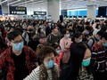 Hành khách tại sân bay ở Trung Quốc. Ảnh: The Straitimes