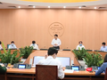 Họp Ban Chỉ đạo phòng, chống COVID-19 tại UBND TP. Hà Nội. Ảnh: Minh Thúy 