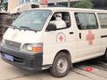 Xe cấp cứu đi ra từ bệnh viện (Ảnh - Minh Thuý)