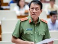 Bộ trưởng Bộ Công an Lương Tam Quang trả lời chất vấn. Ảnh: Quochoi.vn
