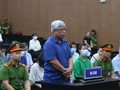 Phong bì nửa tỷ đồng trong túi hoa quả tặng sinh nhật cựu tổng cục trưởng