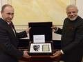 Thủ tướng Narendra Modi và Tổng thống Putin ngày 23.12 trong buổi trao quà tại điện Kremlin