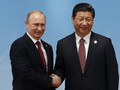 Tổng thống Nga Vladimir Putin (trái) và Chủ tịch Trung Quốc Tập Cận Bình - Ảnh: Reuters