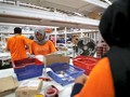 .Nhân viên Lazada đang làm việc tại một kho hàng ở Jakarta, Indonesia. Ảnh: Reuters
