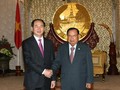Tổng Bí thư, Chủ tịch nước Lào Bounnhang Vorachith tiếp đón Chủ tịch nước Trần Đại Quang Ảnh: TTXVN