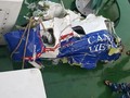 Các mảnh vỡ máy bay CASA-212 được tìm thấy ngày 17-6. Ảnh: Bộ Quốc phòng