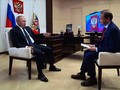 Tổng thống V.Putin trong cuộc phỏng vấn trên kênh truyền hình  "Russia-1" về sự giúp đỡ của Nga giành cho Belarus  (Ảnh: TASS)