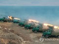 Dàn pháo của Triều Tiên bắn tên lửa trong cuộc tập trận diễn ra ở khu vực biên giới biển với Hàn Quốc.