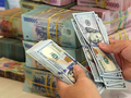 Diễn biến tỷ giá USD/VND tăng chậm trong khi USD tăng trở lại