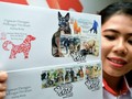 Pos Malaysia gần đây đã đưa ra một loạt tem kỷ niệm với hình ảnh những chú chó để chào mừng năm Mậu Tuất. Ảnh: Bernama