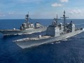Hai tàu chiến Mỹ hộ tống tàu tấn công đổ bộ USS America hoạt động ở vùng biển Malaysia (Ảnh: US Navy).