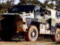 Xe thiết giáp bánh hơi hạng nhẹ Bushmaster của Úc. Ảnh Army Recorgnition