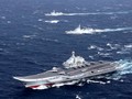 Tàu sân bay Liêu Ninh huấn luyện trên Biển Đông. Ảnh Reuters