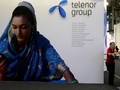 Quảng cáo của Telenor, một trong những nhà cung cấp dịch vụ viễn thông đang hoạt động tại thị trường bùng nổ Myanmar - Ảnh: Reuters