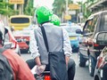 Nhiều người đã dùng ứng dụng Grab để đặt dịch vụ xe máy, ô tô.