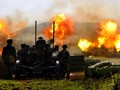 Pháo binh nhả đạn diệt mục tiêu trong cuộc diễn tập bắn đạn thật